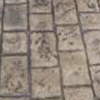 cobblestone-pattern-stamped-concrete-with-charcoal-antiquing