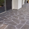 flex-c-ment-stamped-and-carved-decorative-concrete-that-mimicks-a-gray-stone-flagstone-veneer