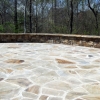stone veneer patio and seat wall