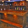 vertical stamped stone bar with acid stain
