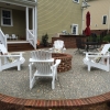 Aggregate concrete patio with brick fire pit