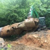 Removing crushed culvert