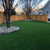 artificial turf with horizontal slat wood fence