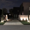 Modern home with landscape lighting