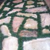 Natural stone walkway with Mondo grass