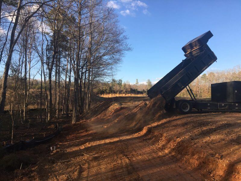 Engineered grading and site preparation, dirt removal, dirt placement, heavy equipment