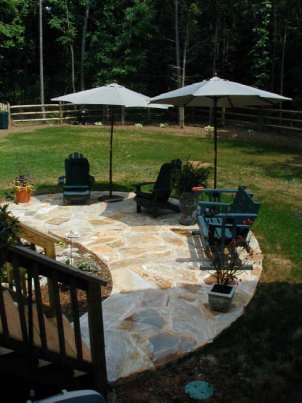 Custom Stone Patio Installation | Natural Hardscape Design for Luxury Outdoor Living Spaces