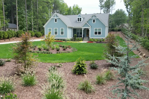 Large-diameter stormwater pipe was installed to safely capture and redirect water away from the home's foundation and outdoor living areas.