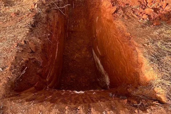 Multiple drainage pipes were found crushed, improperly installed, or sloped in the wrong direction, rendering the system ineffective