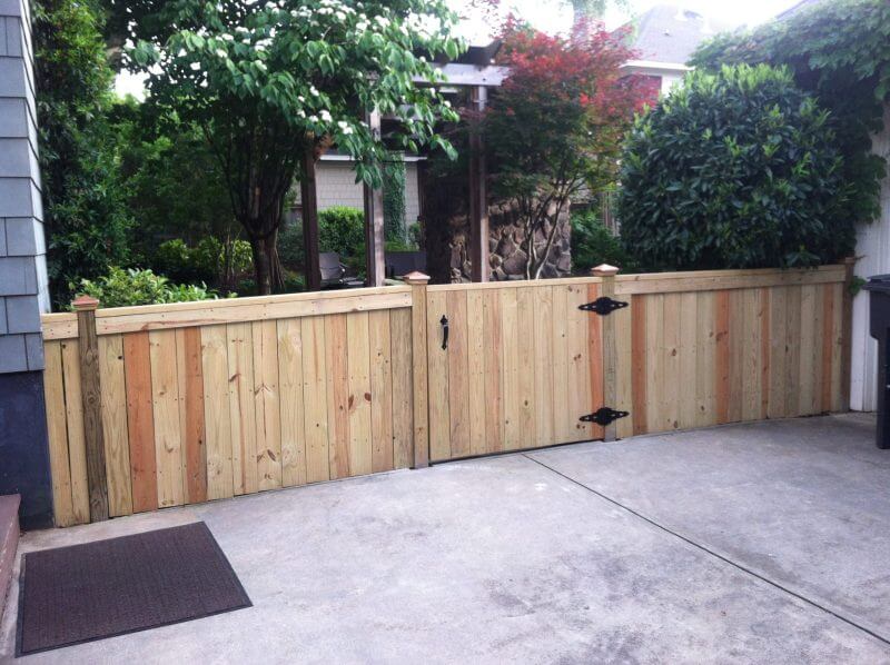 Wooden privacy fence with gate