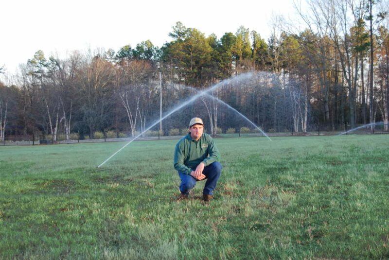 Horse pasture irrigation system, proper irrigation leads to lush green grass; Custom Sprinkler System Installation Waxhaw NC | Engineered Landscape Irrigation for Healthy, Sustainable Lawns